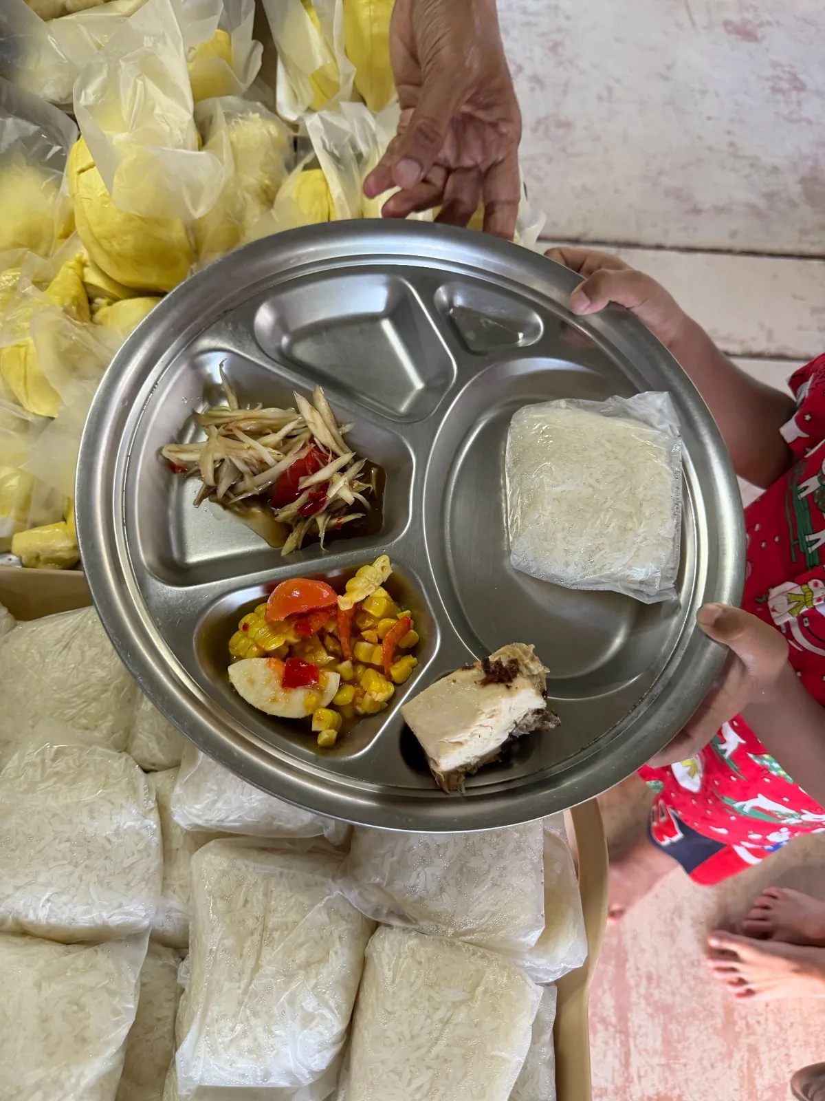 Community support and food donations on Koh Siray